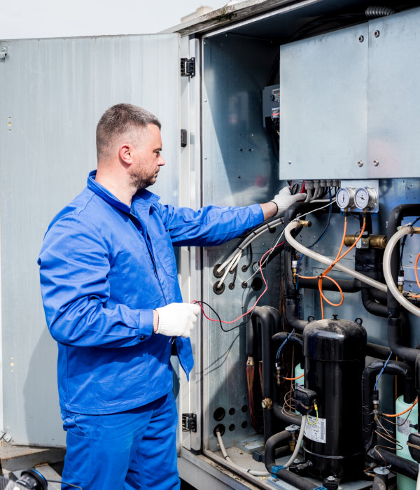 man checking the temperature sensors