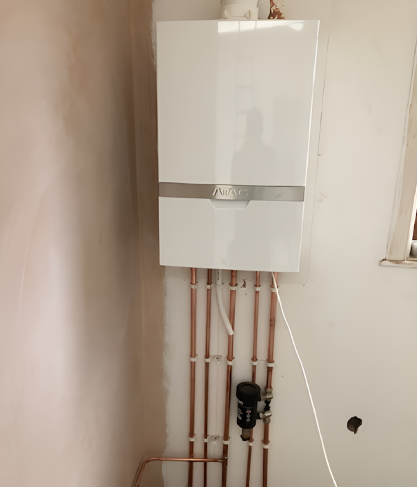 A gas boiler installed in a room