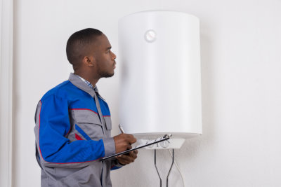 man checking the boiler