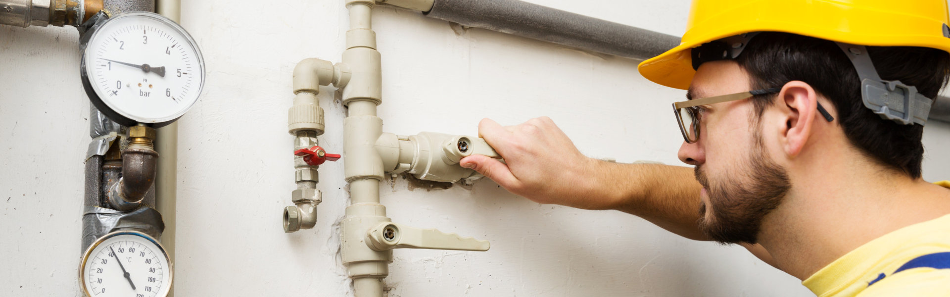 man checking the pipes